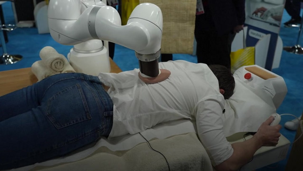 AI masseuse with robotic arm goes on display at CES tech show in Las Vegas