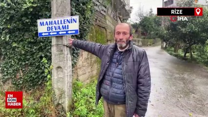 Rize'de muhtar mahallenin devamını tabelayla gösteriyor