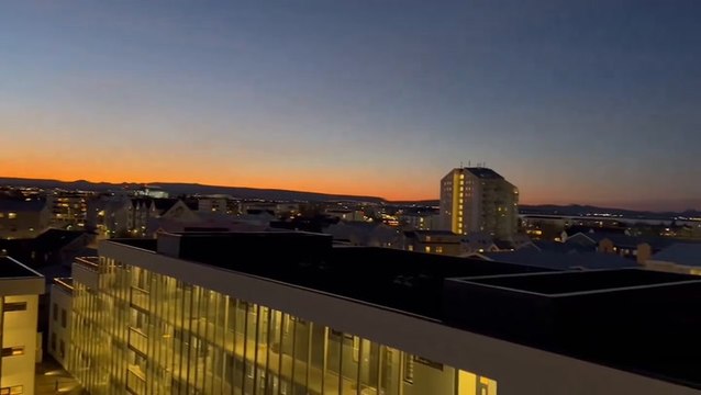 Sky glows orange across Iceland’s Reykjavik as volcano erupts in distance