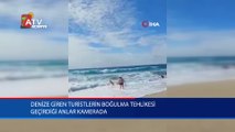 Denize giren turistlerin boğulma tehlikesi geçirdiği anlar kamerada