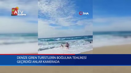 Denize giren turistlerin boğulma tehlikesi geçirdiği anlar kamerada