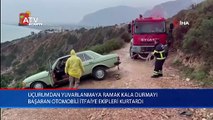 Uçurumdan yuvarlanmaya ramak kala durmayı başaran otomobili itfaiye ekipleri kurtardı