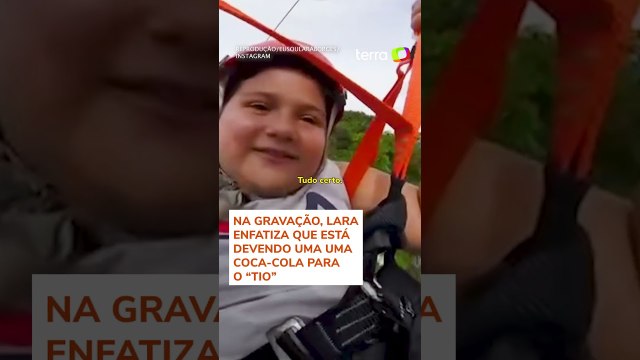 Menina viraliza com reação ao ficar presa em tirolesa: 'Devendo uma coca para o tio’ #shorts