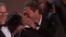 The Bear star Ebon Moss-Bachrach kisses producer Matty Matheson on-stage after Emmys win