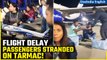 Viral: Goa To Delhi IndiGo Flight Chaos - Passengers Eating on Mumbai Airport Tarmac | Oneindia News