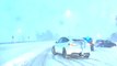 White Car Slides Sideways on Snow Covered Road