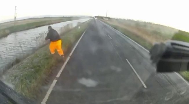 Hero lorry driver saves driver whose car plunged into a freezing water-filled ditch