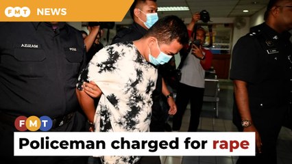 Cop charged with raping student