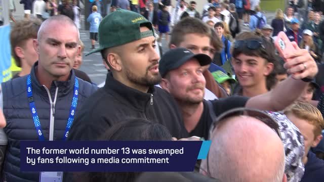 Kyrgios swamped by fans at Australian Open