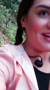 Woman Calmly Walks Away From Black Bear