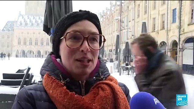 Parisians and tourists revel as snow blankets France's capital