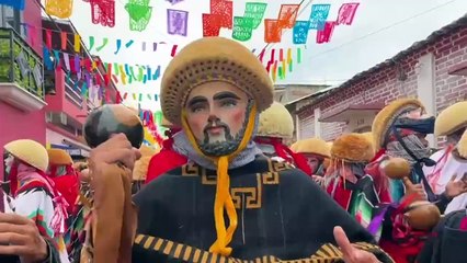 Masked 'Parachicos' dancing in the streets of southern Mexico