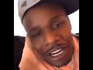 DaBaby Argues With Woman In Airport While Flexing Money