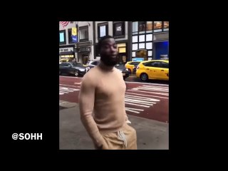 Gucci Mane Walks In The Rain Through The Streets Of New York City