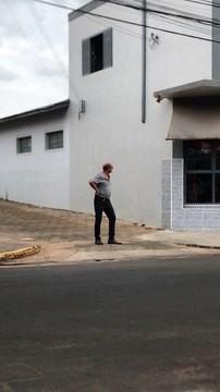 Bird Swoops Over Man's Head