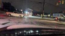 Vehicles Struggle to Stop at Icy Intersection