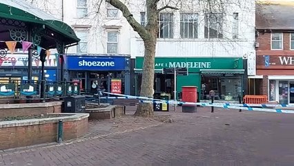 Police tape off Ashford high street