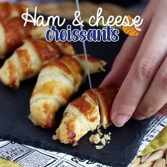 Puff pastry croissants with bechamel, ham, and cheese