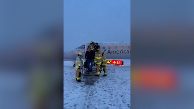 Watch: American Airlines plane carrying 53 passengers skids off icy New York airport runway
