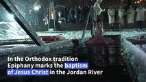 A n-ice cold dip for Russians marking Jesus's baptism on Epiphany