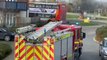 Fire crews tackle blaze at bus stop in Ashford