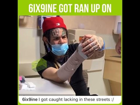 6ix9ine Gets Arm Bandaged Up After Getting Run Up On
