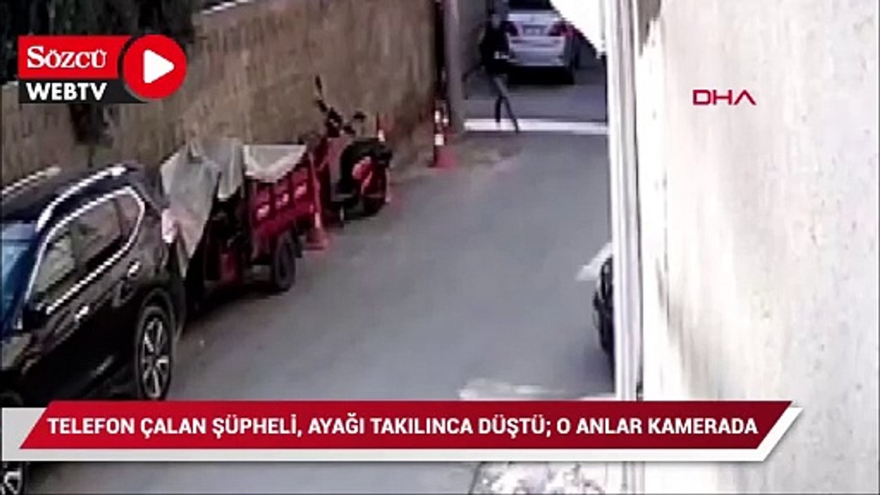 Telefon çalan şüpheli, ayağı takılınca düştü; o anlar kamerada