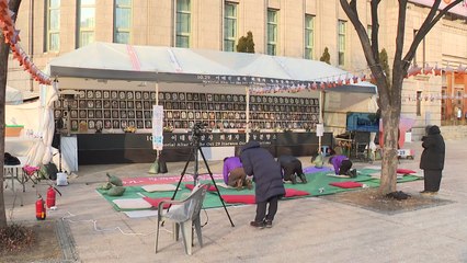 이태원참사 유가족, 한파 속 만5천9백배 돌입..."특별법 촉구" / YTN