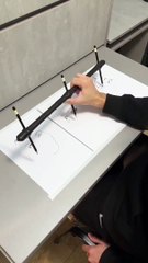 Three Simultaneous One-Handed Drawings