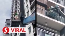 Locked out of her home, woman rents crane to take her four storeys up
