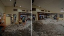 Huge wave rips through Marshall Islands restaurant as diners flee in terror