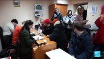 Russians queue to register election candidate opposed to Ukraine offensive