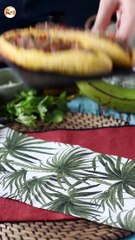 Plantains stuffed with shredded meat and grated cheese