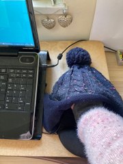 Mum's WFH home to keep hands warm