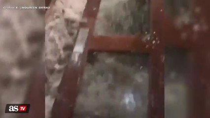 WATCH: Massive wave crashes into U.S. Army Base, rips off doors