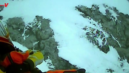 Footage Captures U.S. Coast Guard Officers Rescue Fisherman From Frozen Lake Amidst Arctic Blast