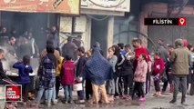 Filistinliler dağıtılan yemeklere ulaşabilmek için saatlerce sıra bekliyor