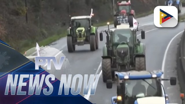 French farmers protest on the streets vs. gov't excessive regulation, taxes, etc.