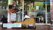 Angus Kitt busking on Peel Street in Tamworth