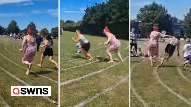 Konkurrenzfähige Mutter schubst andere Mutter am Sporttag aus dem Weg