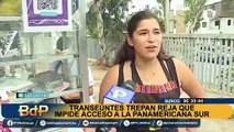 Surco: transeúntes tuvieron que trepar reja de municipio porque impedía acceso a Panamericana Sur
