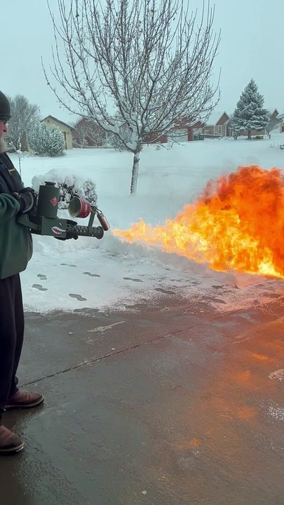Dad Uses Flamethrower For Snow Removal