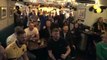 Fans celebrate from a local pub as Maidstone beat Ipswich Town in the FA Cup 4th round