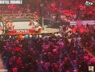 Seth Rollins eating popcorn and watching the WWE Men's Royal Rumble Match (January 27 2024)