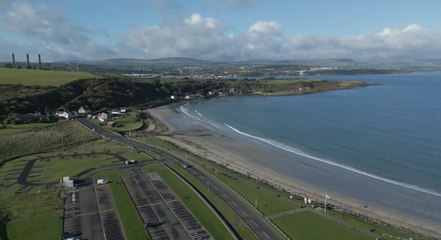 Drone footage captures the rugged beauty of Browns Bay in County Antrim
