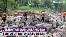 Jembatan dan Jalan Desa Tertutup Batu-Batu Besar Usai Banjir Bandang Terjang Pasuruan