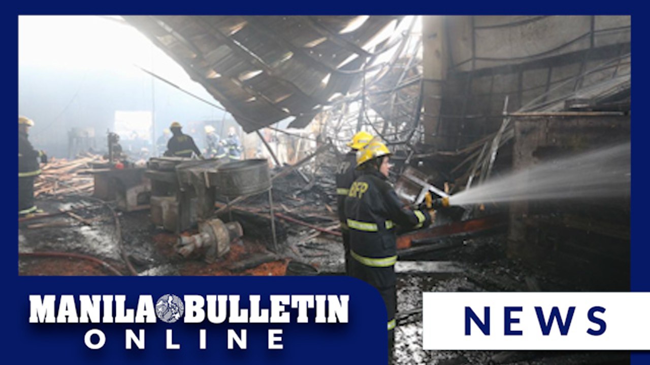 Firefighters respond to fire that razed a warehouse in Quezon City