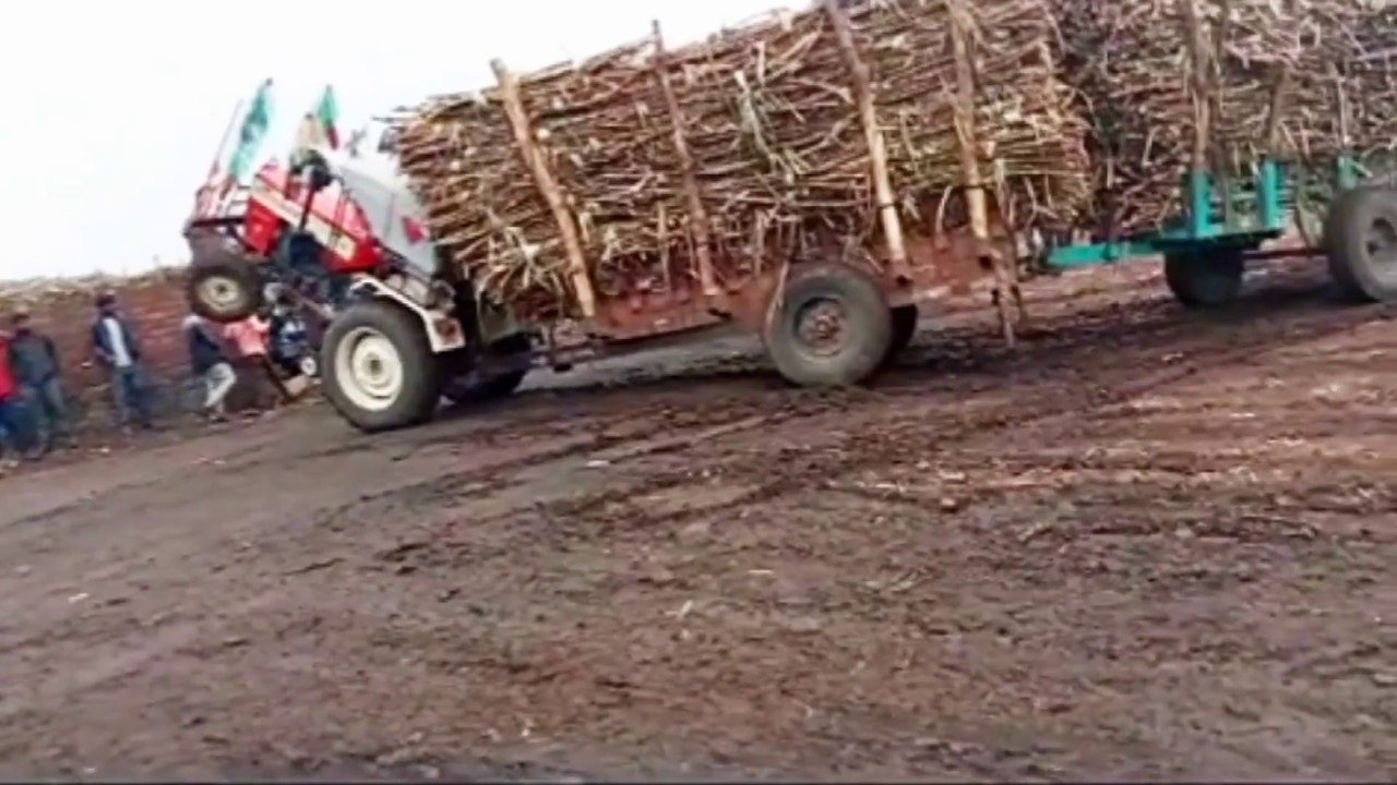 Lift tractor in the air from front side while pulling load sugarcane trolley |  how to drive load tractor