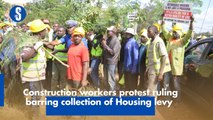 Construction workers protest ruling barring collection of Housing levy