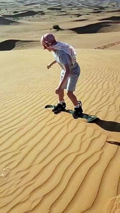 Sandboarding in desert safari Dubai